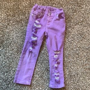 Purple distressed skinny jeans 💜